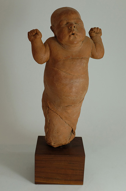 The Newborn
by Beverly Davis, NSS
Fired Clay
25